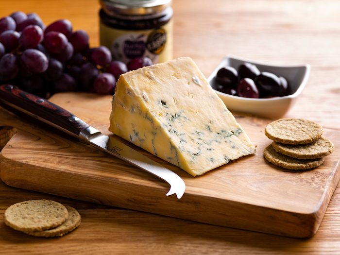 Peakland Blue cheese wedge on cheese board