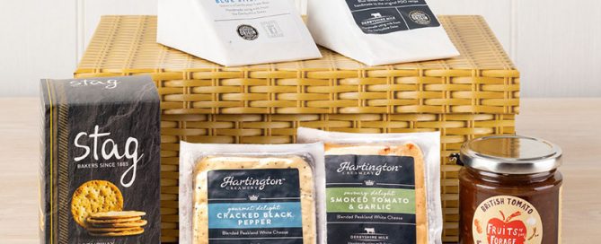 Pikehall cheese box selection with 2 cheese wedges, 2 white cheeses, biscuits and chutney