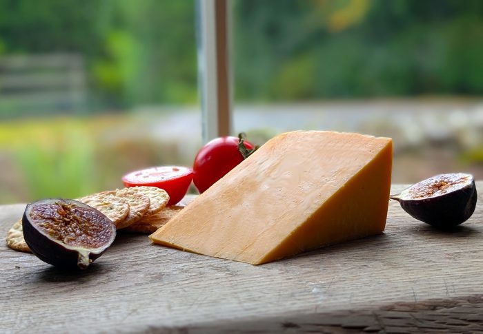 Red Derby Cheese Wedge cheese board