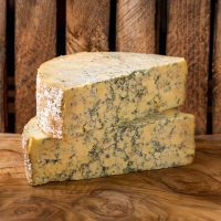 2 halves of Hartington Blue Stilton Cheese wheel