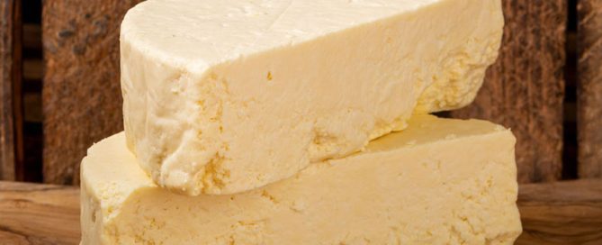 2 halves Hartington Peakland white cheese wheel