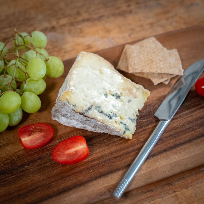 blue cheese grapes and a knife